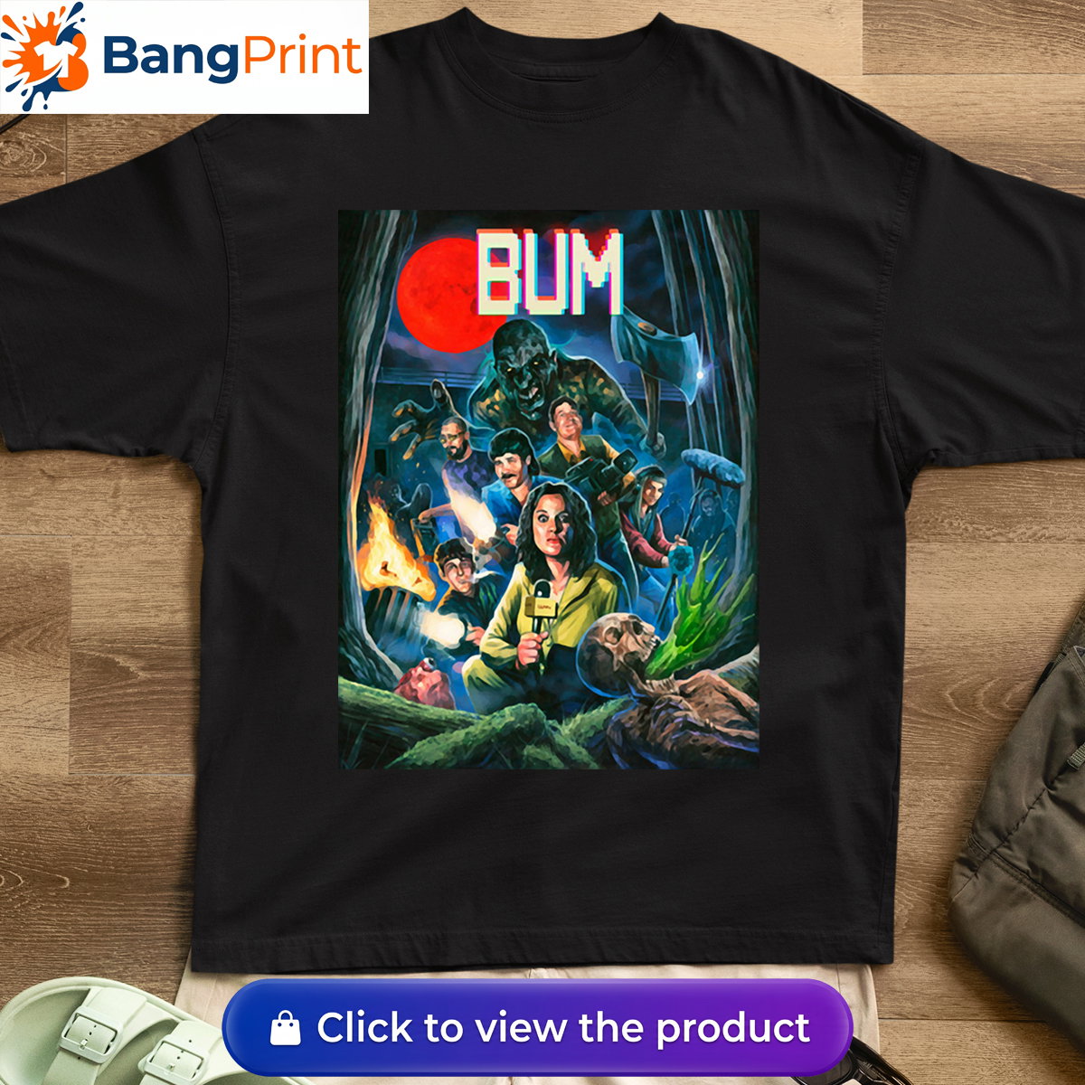 Black cotton t-shirt featuring a retro horror-inspired graphic of a news crew and monsters under a blood moon with the stylized text "BUM".