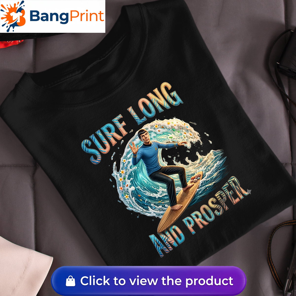 black graphic tee showcasing a Vulcan-like character riding a massive ocean wave.