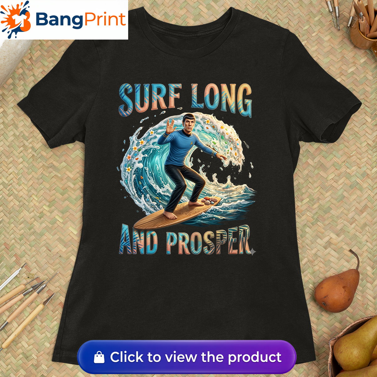 black graphic tee showcasing a Vulcan-like character riding a massive ocean wave.