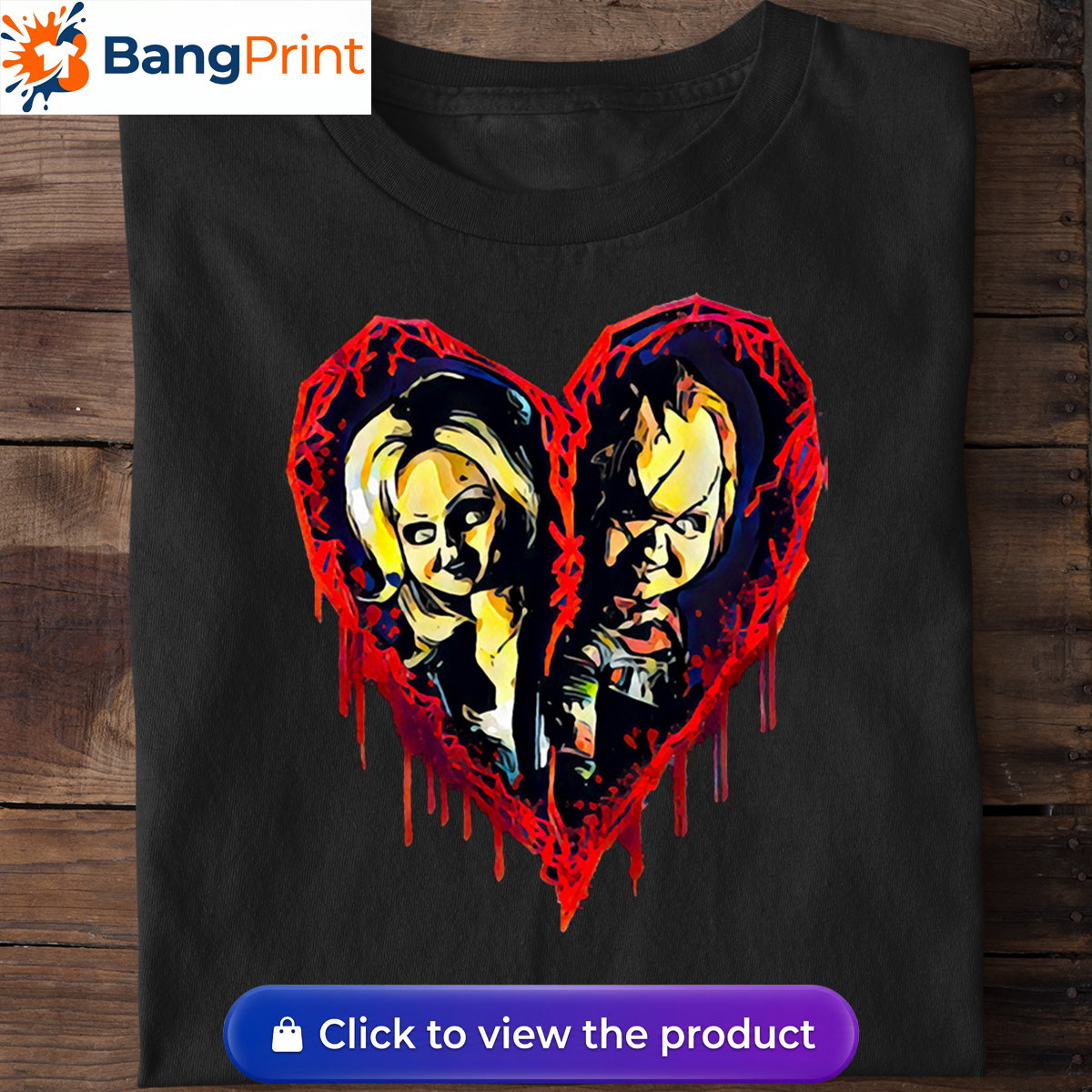 Black short-sleeve t-shirt displaying a graphic of a broken, dripping red bloody heart containing the stylized faces of horror movie characters Chucky and Tiffany.