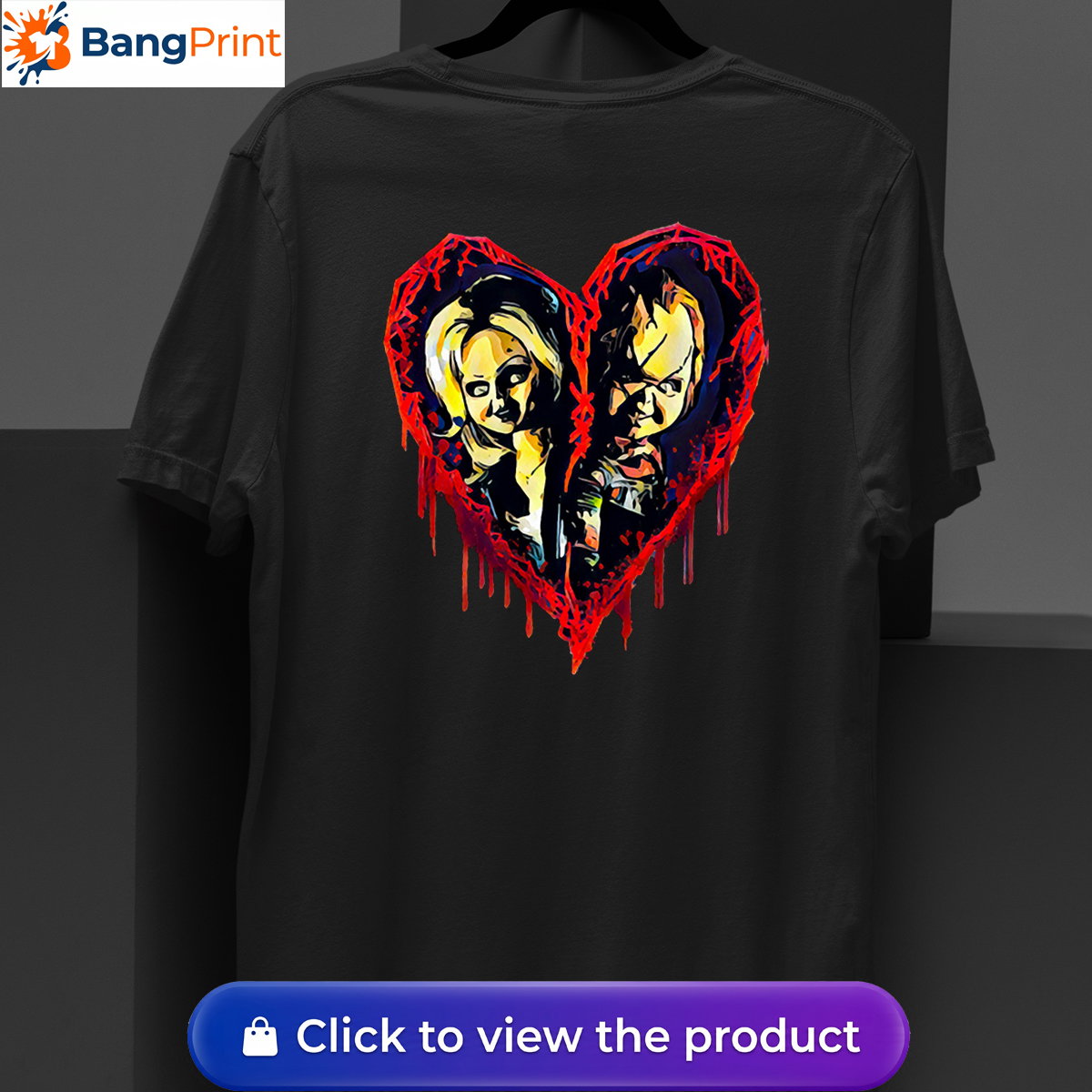 Black short-sleeve t-shirt displaying a graphic of a broken, dripping red bloody heart containing the stylized faces of horror movie characters Chucky and Tiffany.